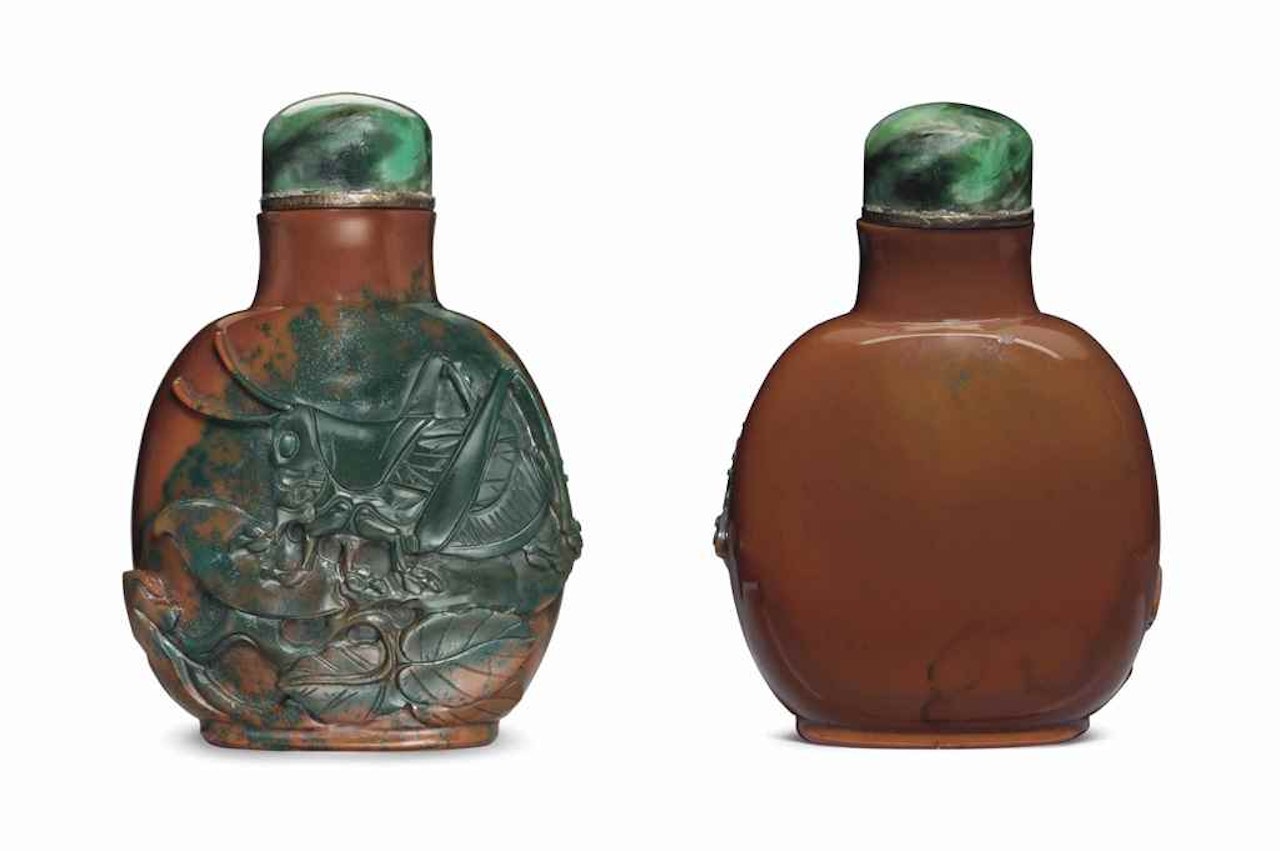 A CARVED JASPER SNUFF BOTTLE by Anonymous