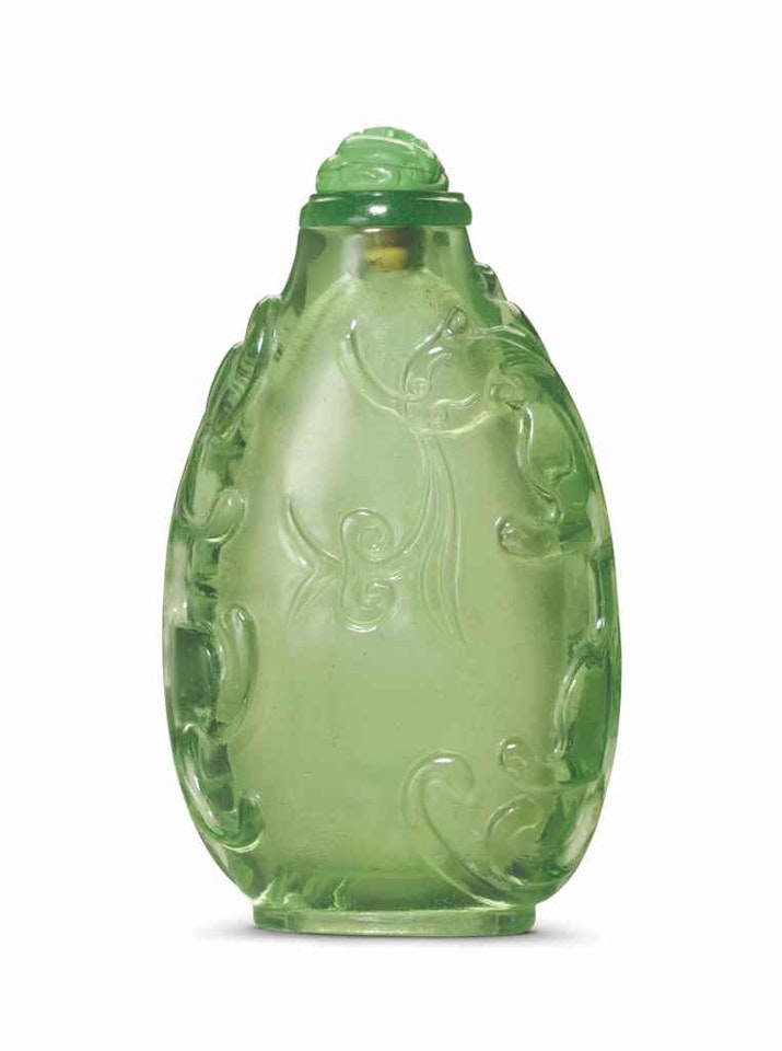 A TRANSPARENT GREEN GLASS SNUFF BOTTLE by Anonymous