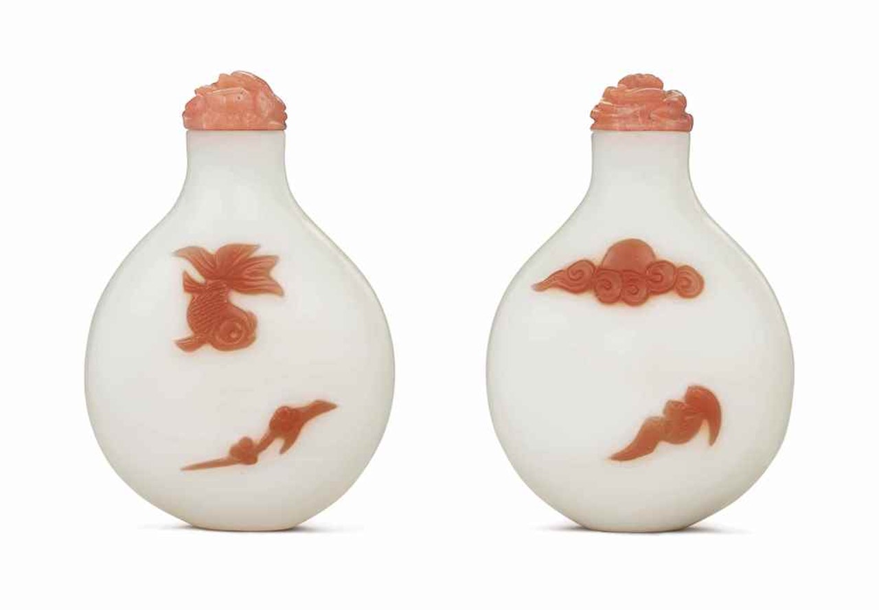 A RED-OVERLAY WHITE GLASS SNUFF BOTTLE by Anonymous