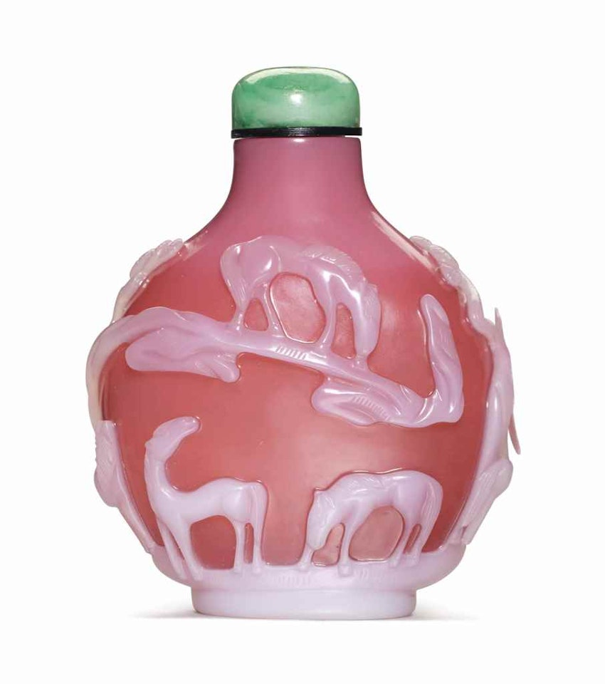 AN UNUSUAL WHITE-OVERLAY PINK GLASS SNUFF BOTTLE by Anonymous