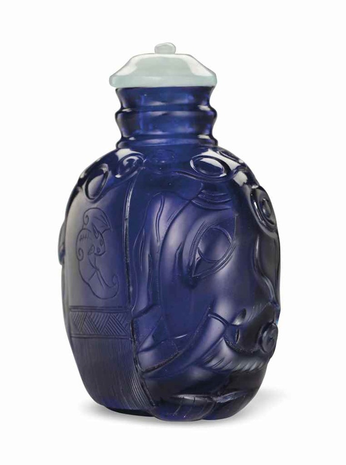 A RARE BLUE GLASS ELEPHANT-FORM SNUFF BOTTLE by Anonymous