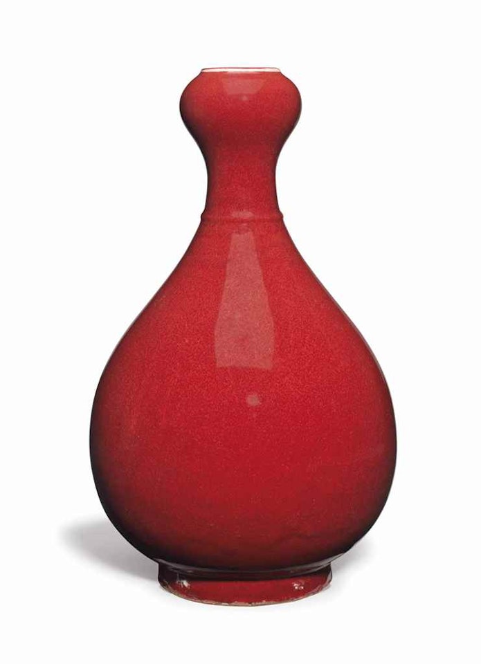 A LARGE CORAL-GROUND 'GARLIC HEAD' BOTTLE VASE by Anonymous