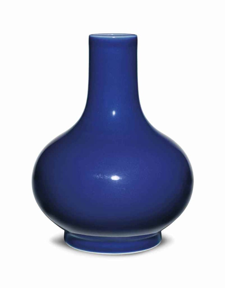 A BLUE-GLAZED BOTTLE VASE by Anonymous