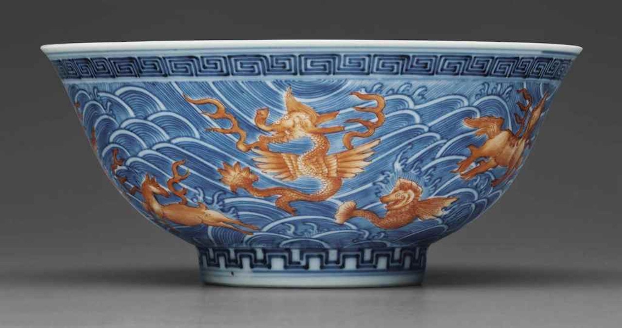 A BLUE AND WHITE AND IRON-RED-DECORATED 'SEA CREATURES' BOWL by Anonymous