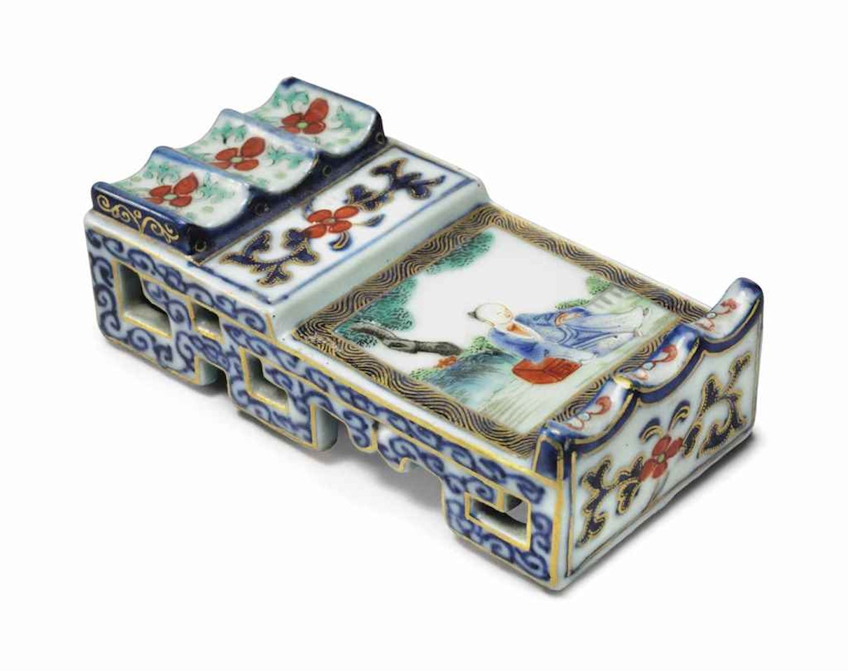 A ROSE-VERTE AND GILT-DECORATED BRUSH REST by Anonymous
