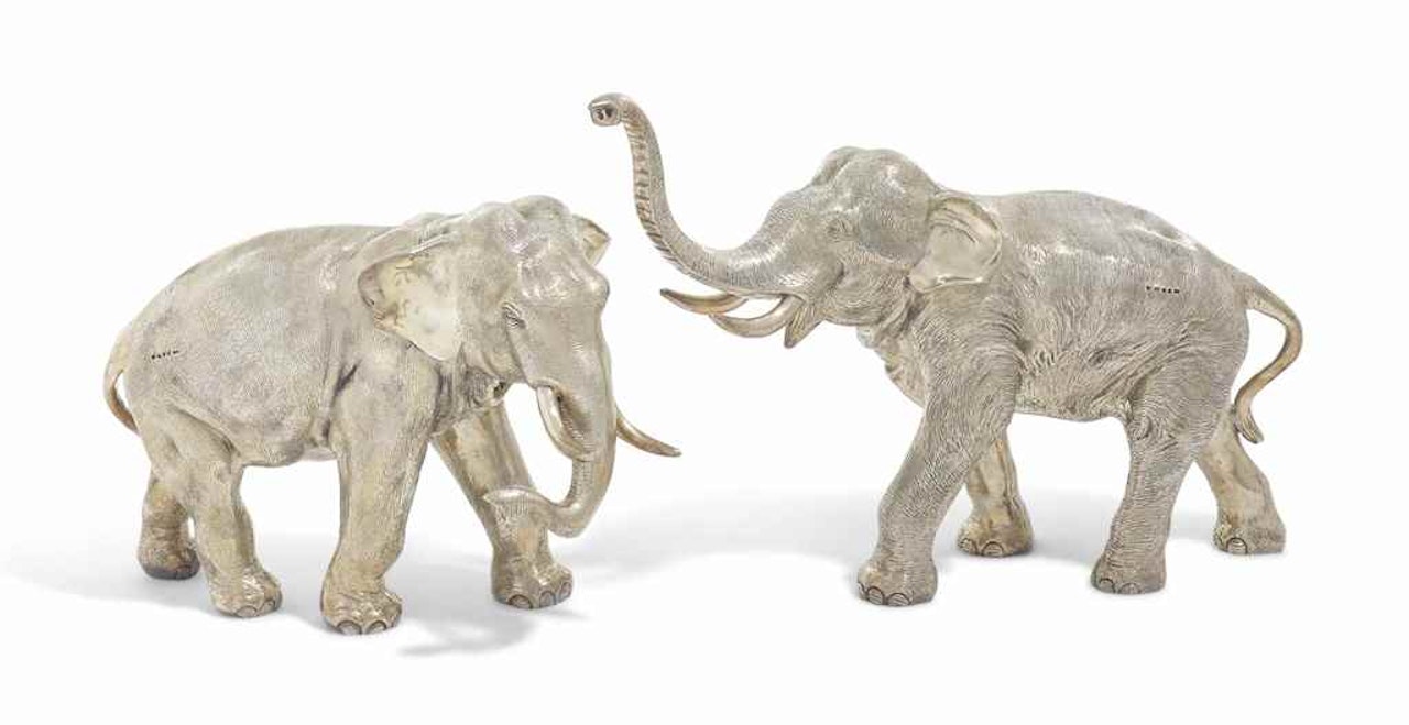 A PAIR OF ELIZABETH II SILVER ELEPHANTS by Anonymous