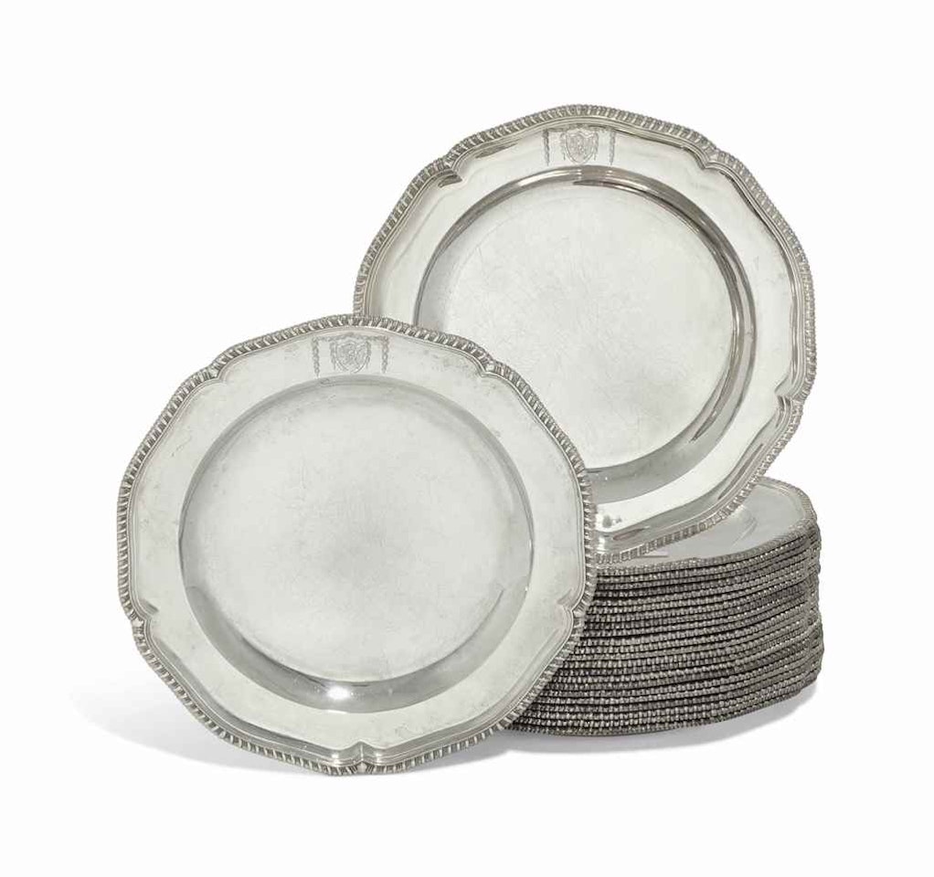A SET OF TWENTY-FOUR GEORGE III SILVER DINNER-PLATES by Anonymous