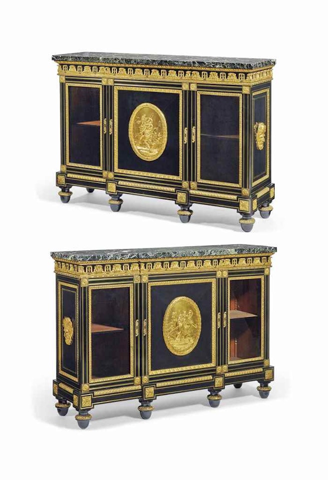 A PAIR OF RESTAURATION ORMOLU-MOUNTED AND BRASS-INLAID EBONY BIBLIOTHEQUE BASSES BY PIERRE-ETIENNE LEVASSEUR OR HIS SON PIERRE-FRANCOIS HENRI LEVASSEUR by Anonymous