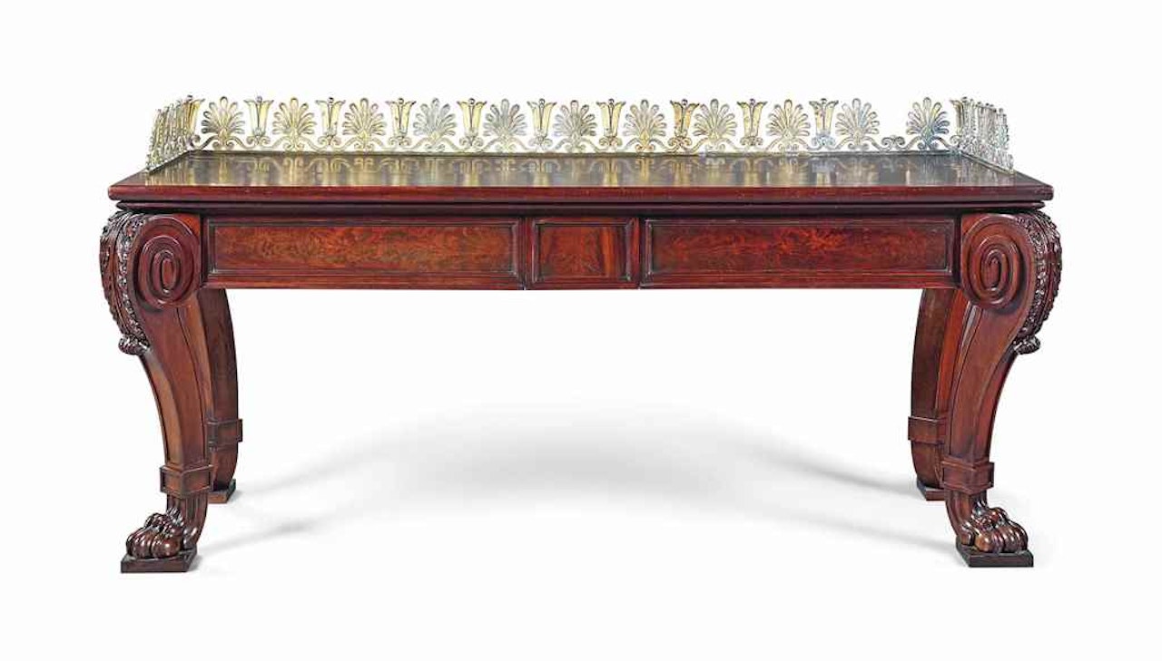 A GEORGE IV ORMOLU-MOUNTED MAHOGANY SERVING-TABLE by Anonymous