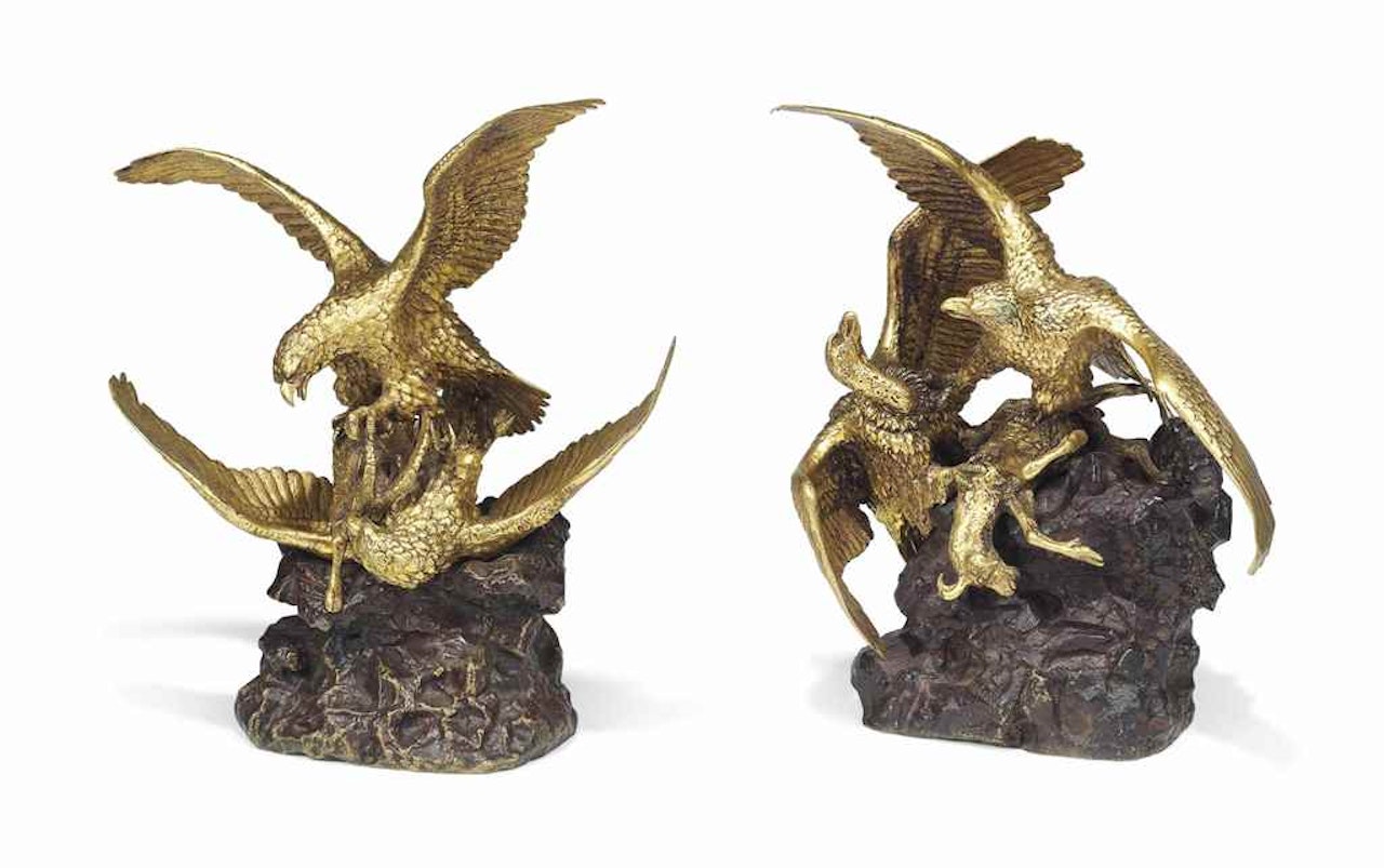 TWO FRENCH GILT AND RED-PATINATED BRONZE GROUPS OF BIRDS OF PREY ATTACKING MOUNTAIN GOATS by Anonymous