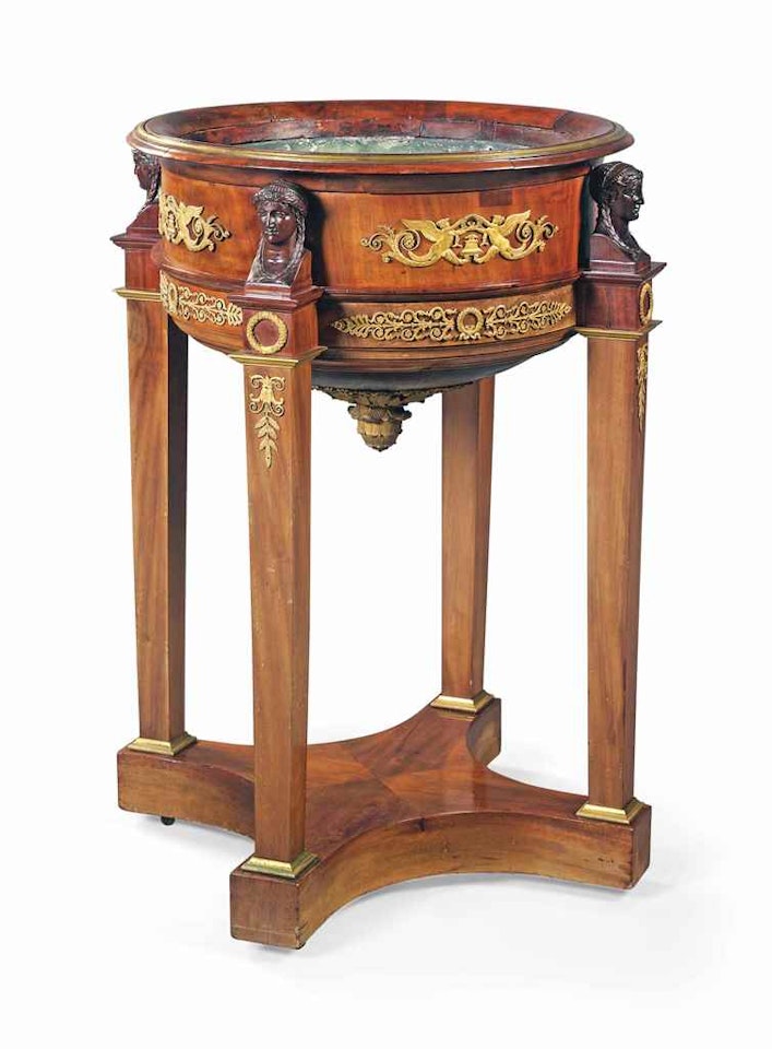 A LARGE EMPIRE ORMOLU-MOUNTED MAHOGANY JARDINIERE by Anonymous