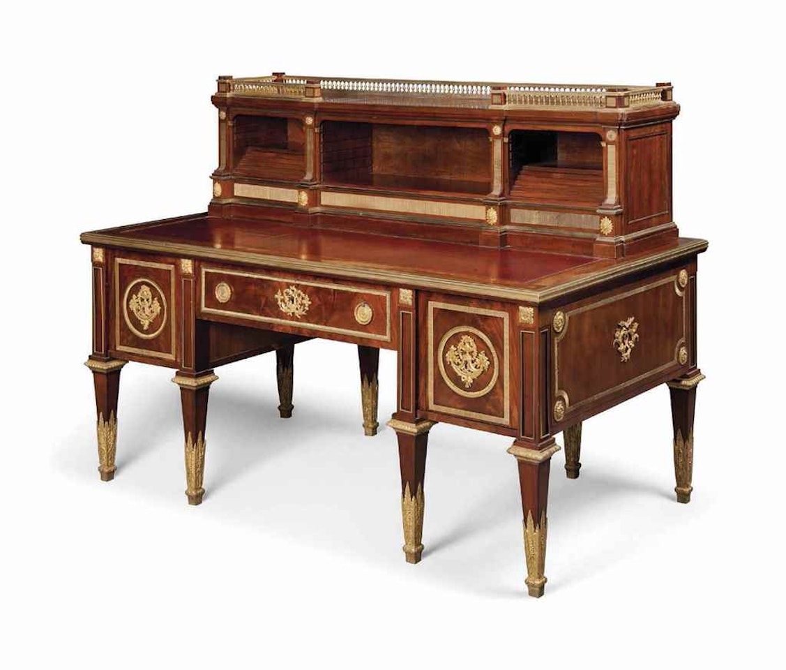 A LOUIS XVI ORMOLU-MOUNTED MAHOGANY BUREAU A GRADIN by Anonymous