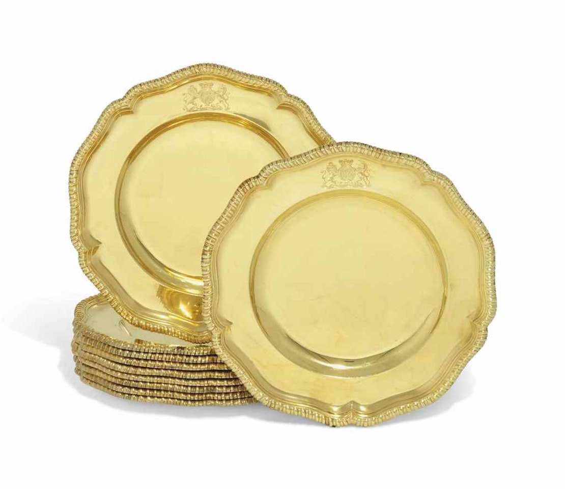 A SET OF TEN GEORGE III SILVER-GILT DINNER-PLATES FROM THE CUMBERLAND SERVICE by Anonymous