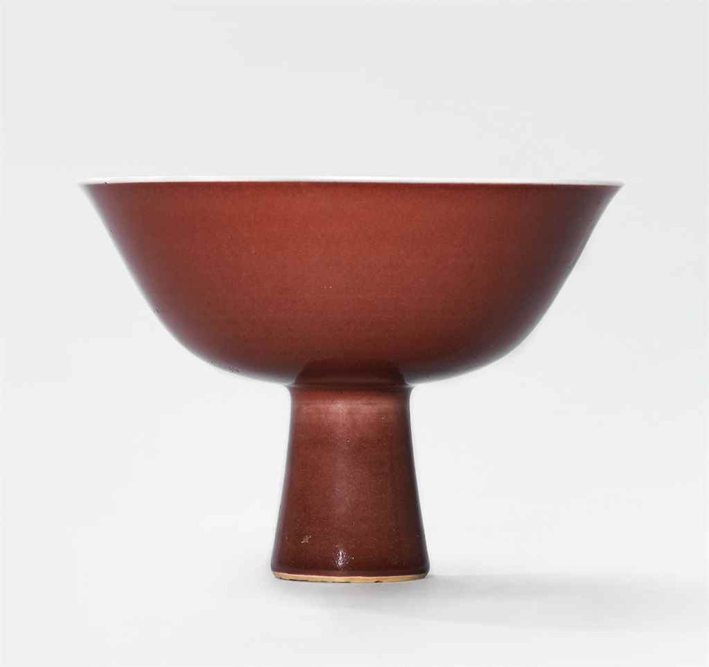 A COPPER-RED GLAZED STEM BOWL by Anonymous