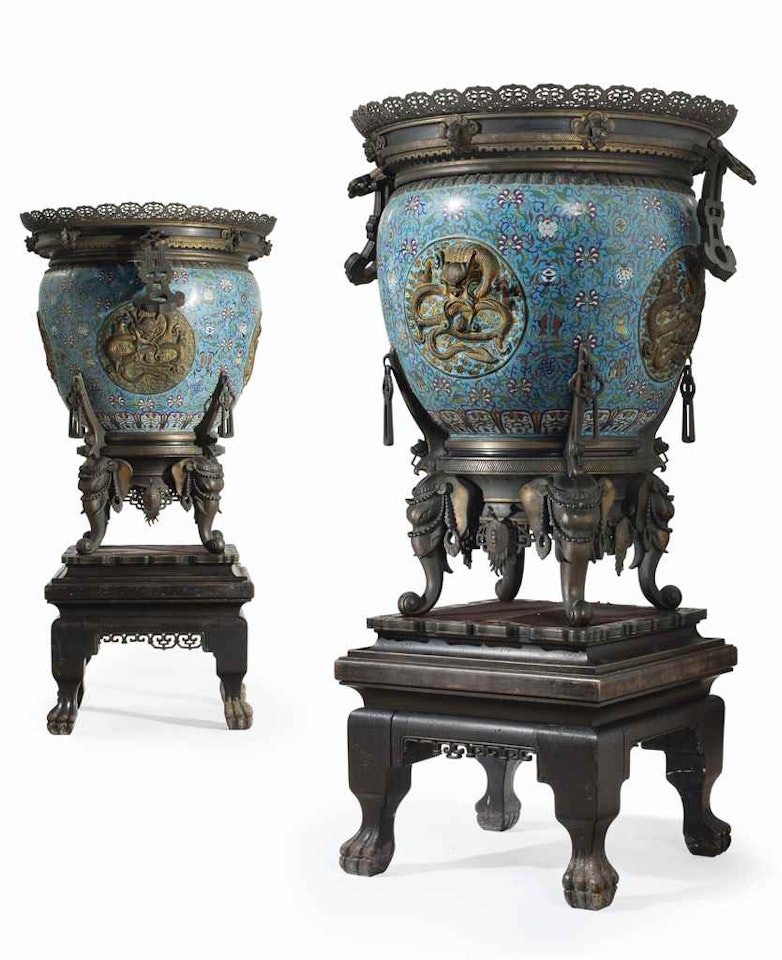 A PAIR OF MASSIVE FRENCH PARCEL-GILT AND PATINATED BRONZE-MOUNTED CHINESE CLOISONNE ENAMEL URNS ON HARDWOOD STANDS by Anonymous