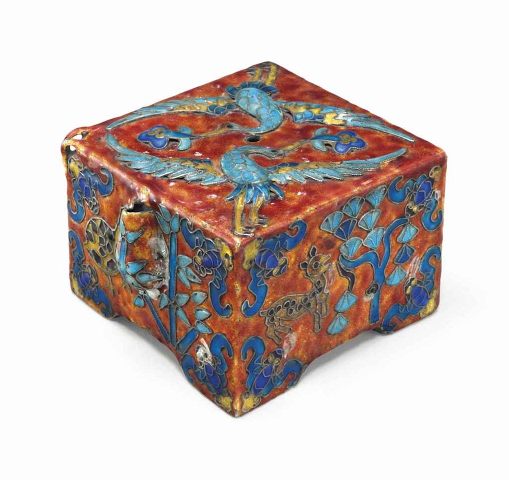 An enamel water dropper by Anonymous