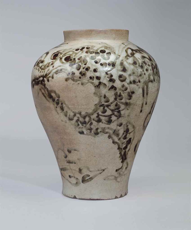An iron-decorated white porcelain jar by Anonymous