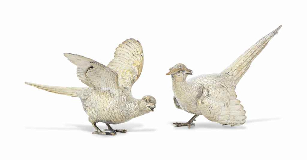 A PAIR OF SILVER MODELS OF PHEASANTS by Anonymous