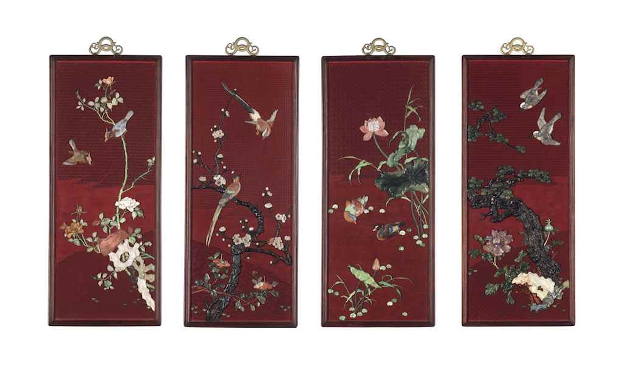 A SET OF FOUR CINNABAR LACQUER AND INLAID 'BIRDS AND FLOWER' PANELS by Anonymous