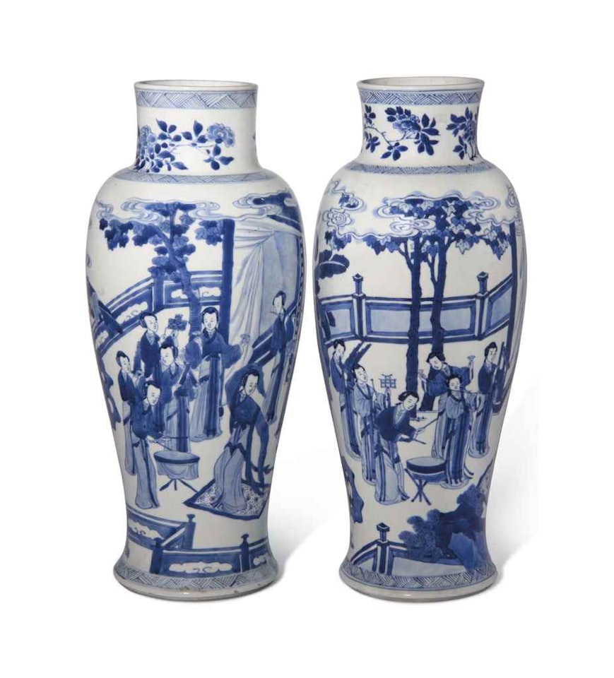 TWO SIMILARLY DECORATED BLUE AND WHITE 'DANCER' VASES by Anonymous