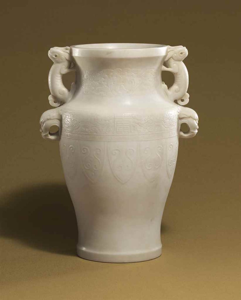 A WHITE MARBLE TWO-HANDLED VASE by Anonymous