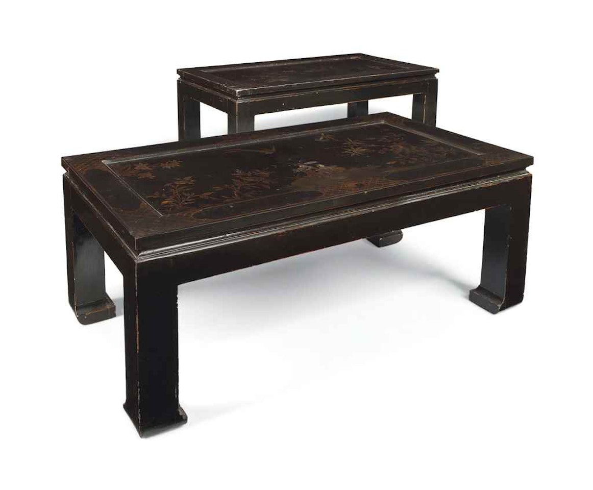 A PAIR OF GILT CHINOISORIE DECORATED BLACK LACQUER COFFEE TABLES by Anonymous