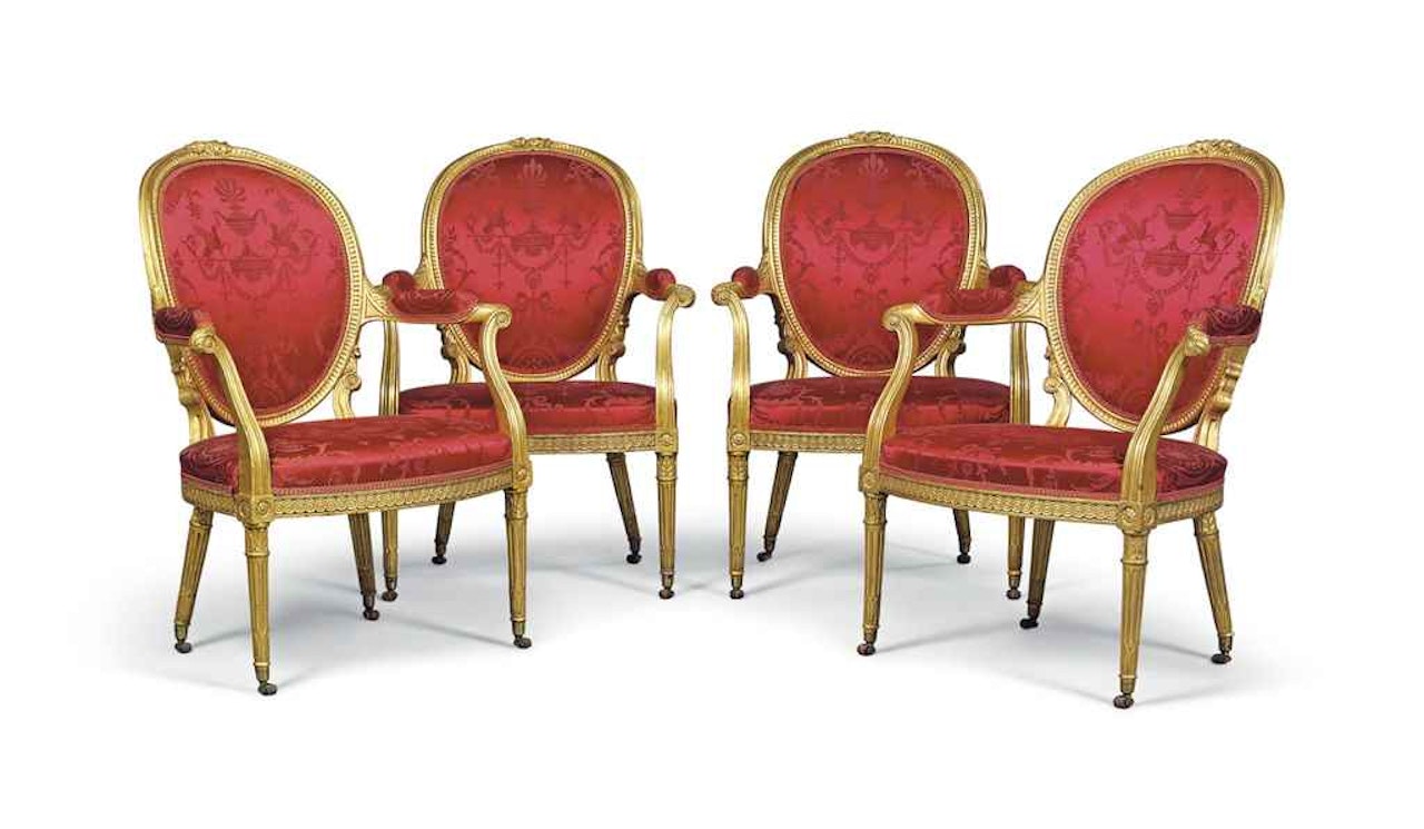 A SET OF FOUR GEORGE III GILTWOOD ARMCHAIRS by Anonymous