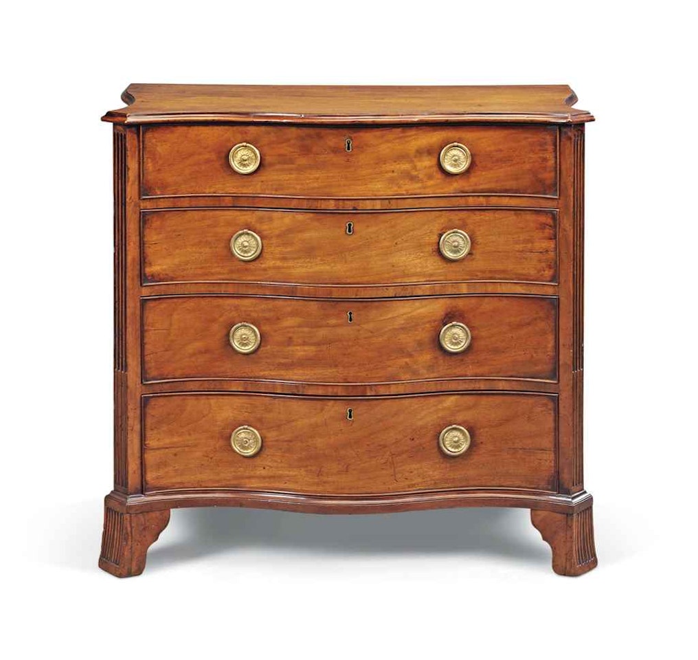 A GEORGE III MAHOGANY SERPENTINE CHEST by Anonymous