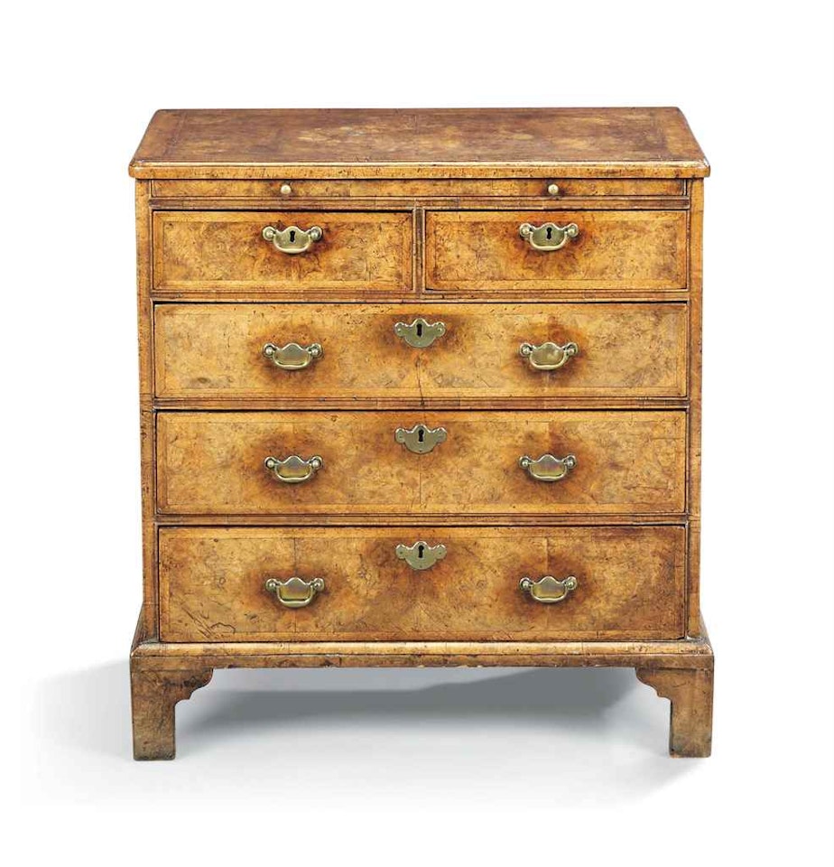 A GEORGE II BURR WALNUT CHEST by Anonymous