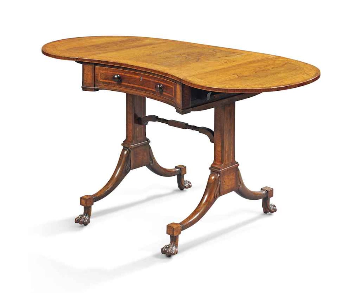 A REGENCY ROSEWOOD AND SABICU-CROSSBANDED SOFA TABLE by Anonymous