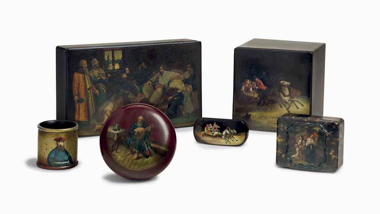 A GROUP OF FIVE LACQUERED PAPIER-MACHÉ BOXES AND A NAPKIN RING by Anonymous