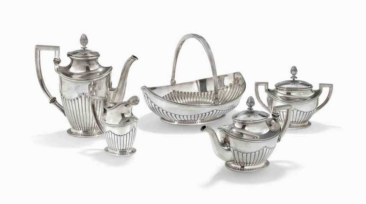 A PARCEL-GILT SILVER TEA AND COFFEE SERVICE by Anonymous