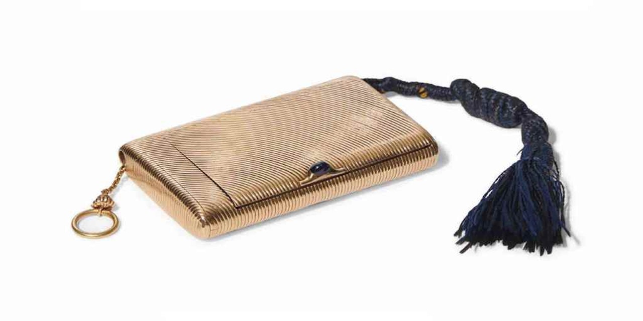 A GEM-SET GOLD CIGARETTE CASE by Anonymous