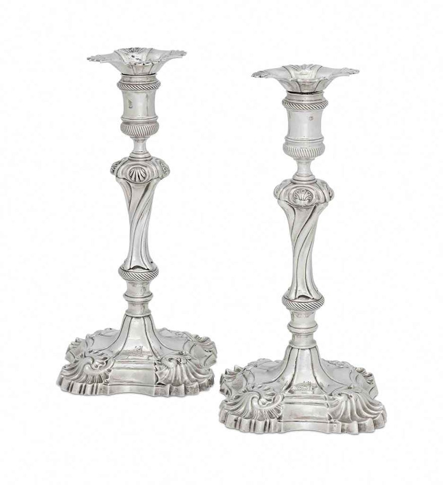 A PAIR OF GEORGE II SILVER CANDLESTICKS by Anonymous