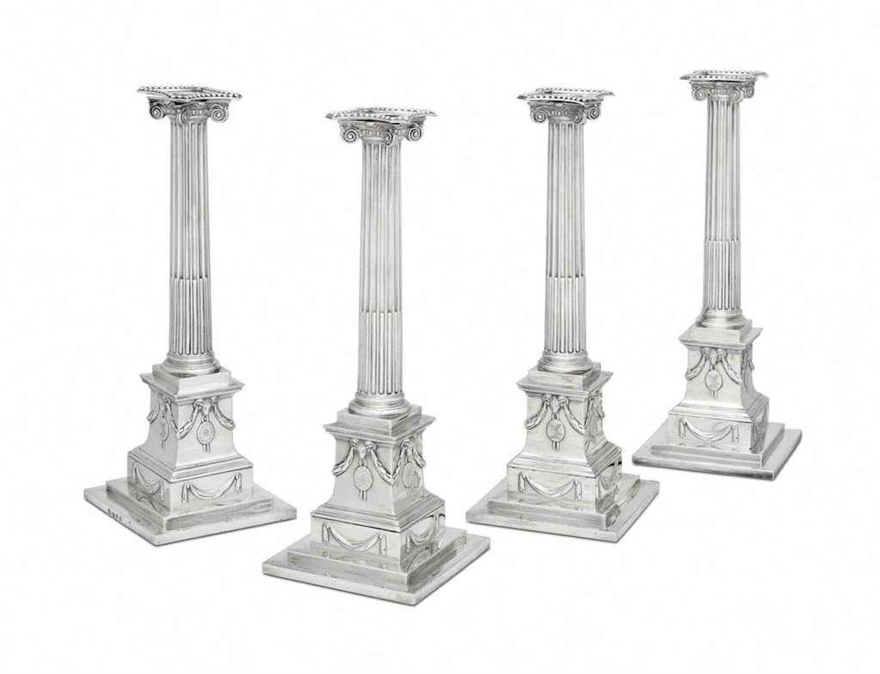 A SET OF FOUR GEORGE III SILVER CANDLESTICKS by Anonymous