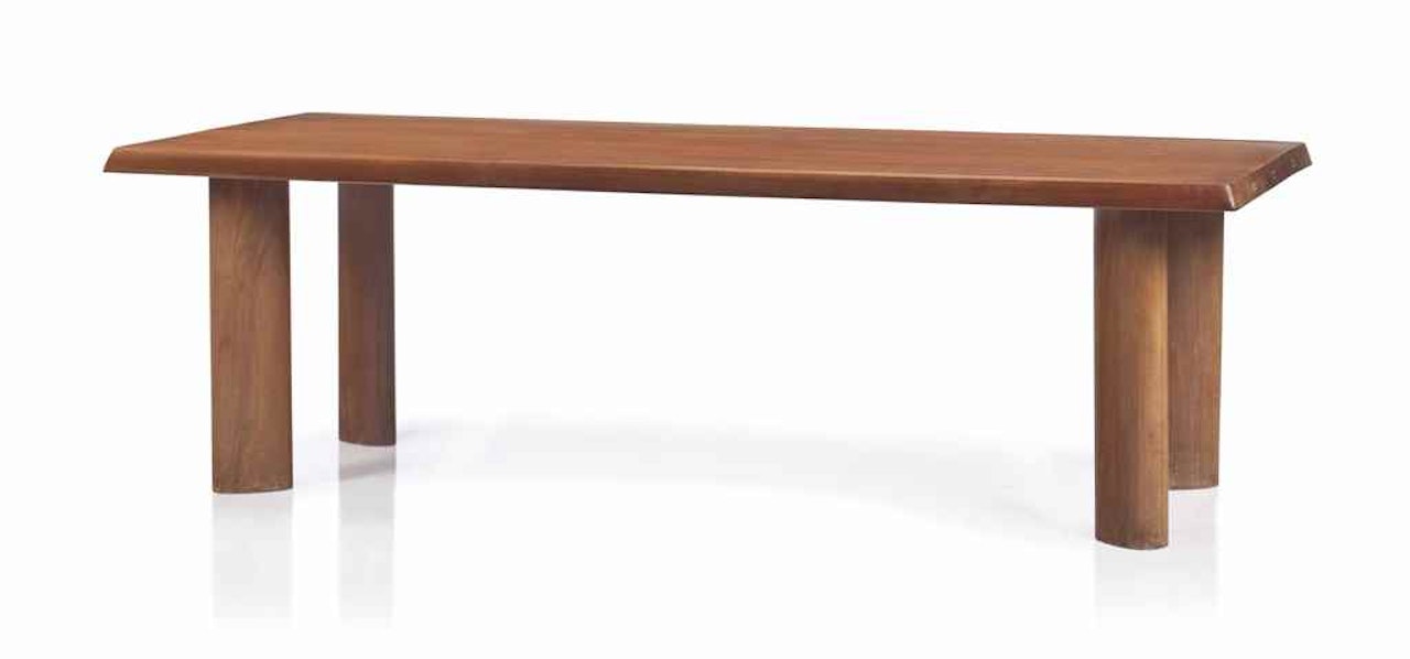 A DINING TABLE, DESIGNED CIRCA 1954 by Charlotte Perriand