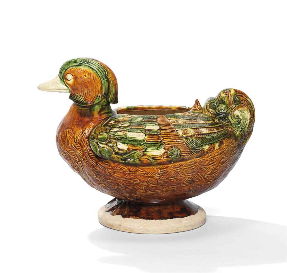 AN EXCEPTIONALLY RARE SANCAI-GLAZED MANDARIN DUCK-FORM VESSEL by Anonymous