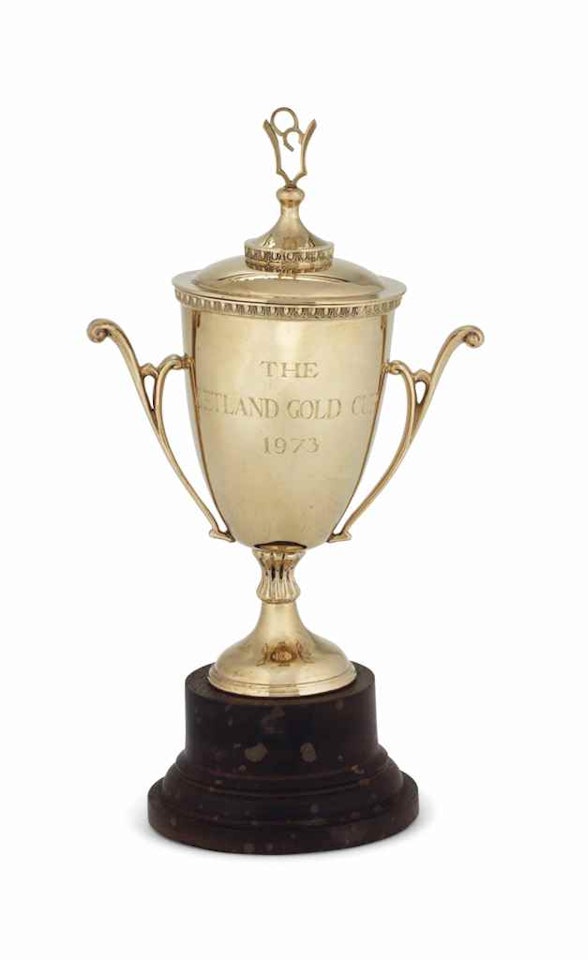 AN ELIZABETH II GOLD CUP AND COVER by Anonymous