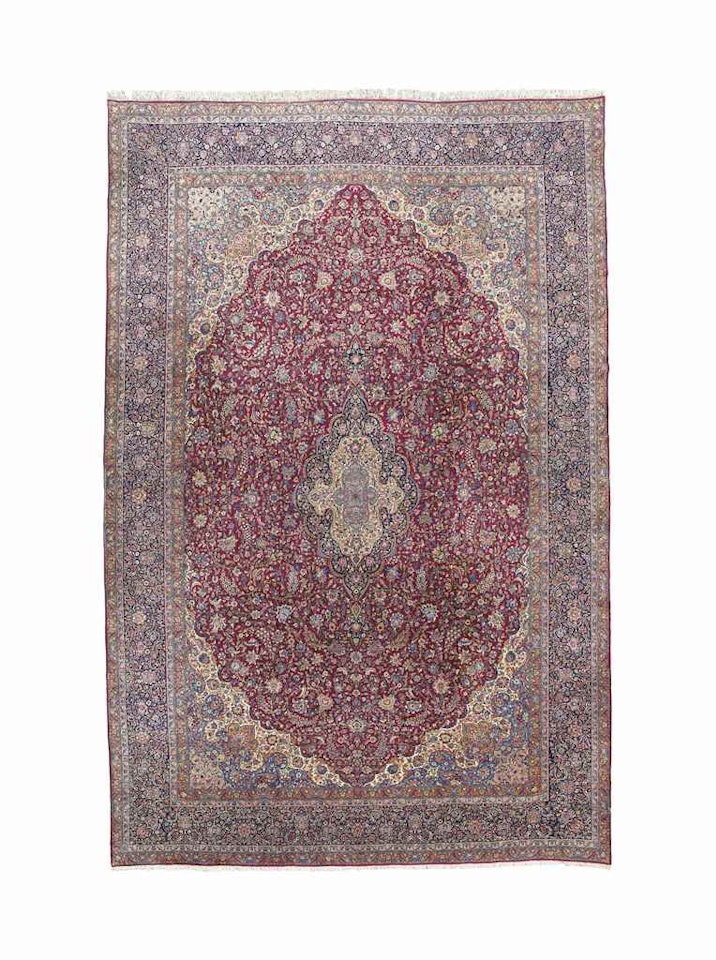 A LARGE KIRMAN CARPET by Anonymous