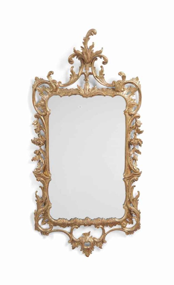 A GEORGE III GILTWOOD MIRROR by Anonymous