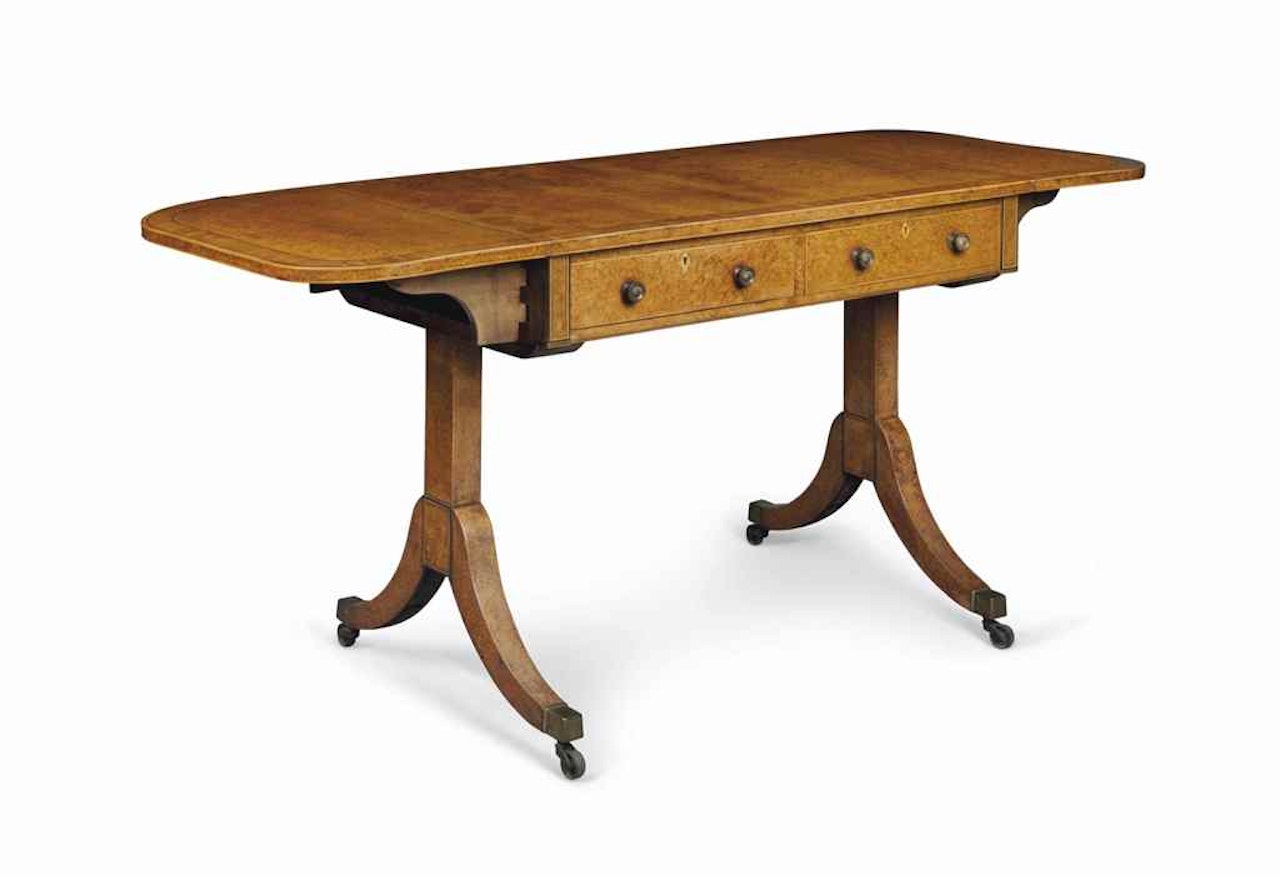 A GEORGE III AMBOYNA AND SATINWOOD CROSSBANDED SOFA TABLE by Anonymous