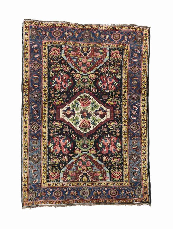 A KARABAGH RUG by Anonymous