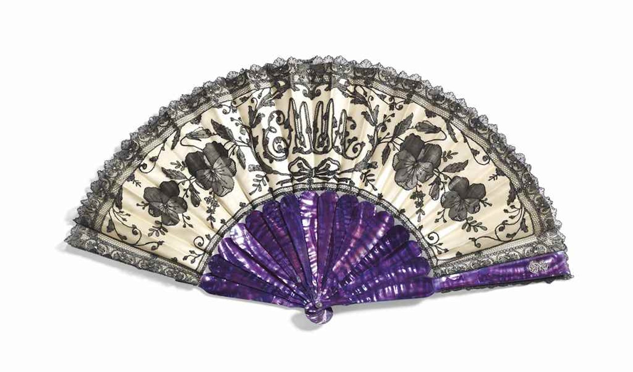 A FRENCH PURPLE-STAINED MOTHER-OF-PEARL FAN by Anonymous