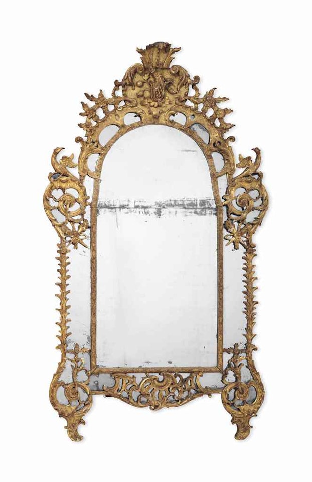 A REGENCE GILTWOOD MIRROR by Anonymous