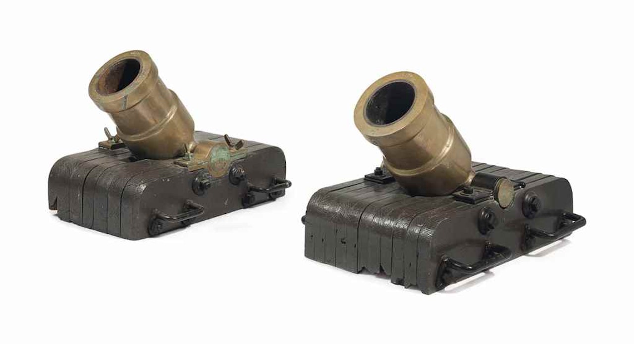 A PAIR OF AMERICAN BRONZE MORTARS by Anonymous