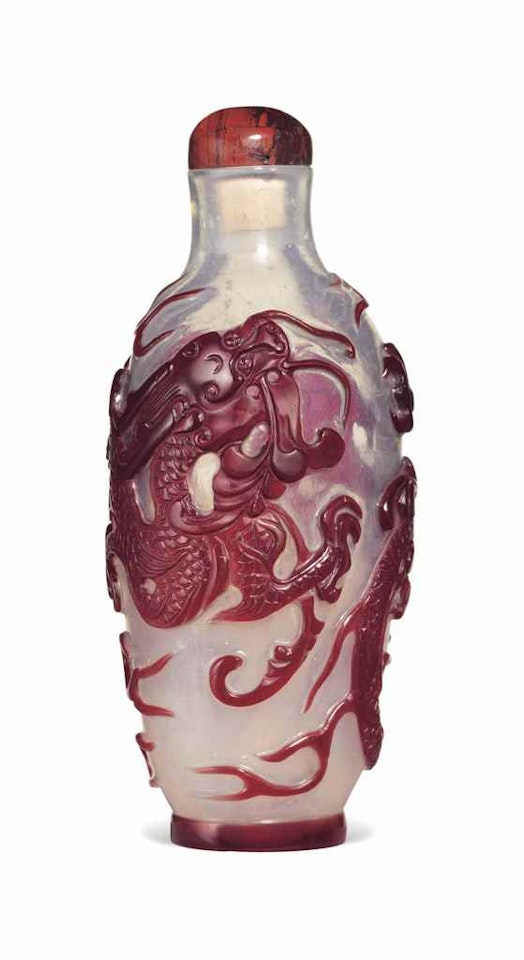 A LARGE RED-OVERLAY GLASS 'DRAGON' SNUFF BOTTLE by Anonymous