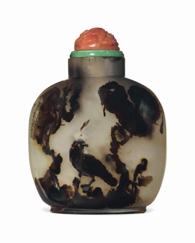 A CARVED SILHOUETTE AGATE SNUFF BOTTLE by Anonymous