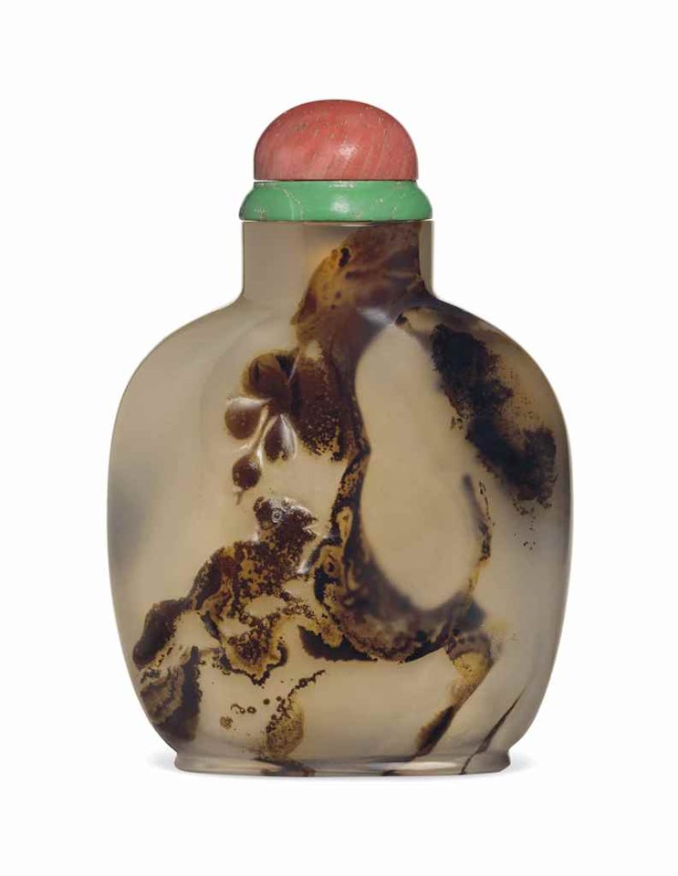 A CARVED SILHOUETTE AGATE SNUFF BOTTLE by Anonymous