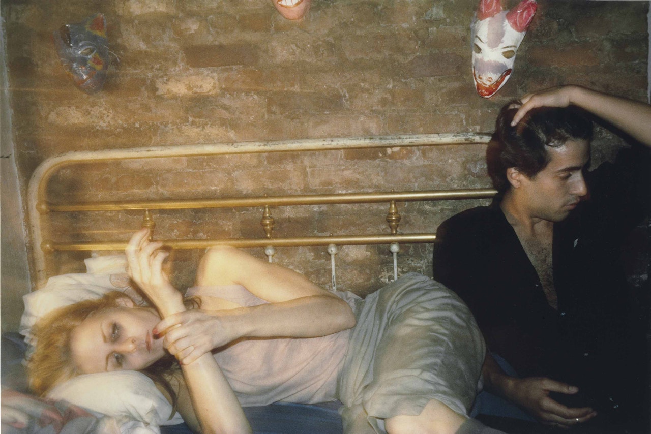 Greer and Robert on the bed, New York City by Nan Goldin