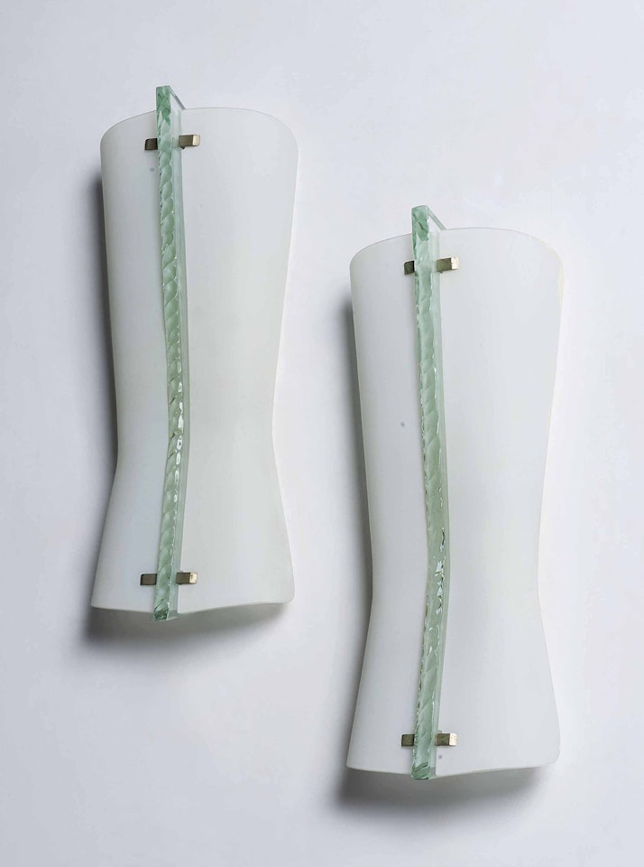 A PAIR OF APPLIQUES by Max Ingrand